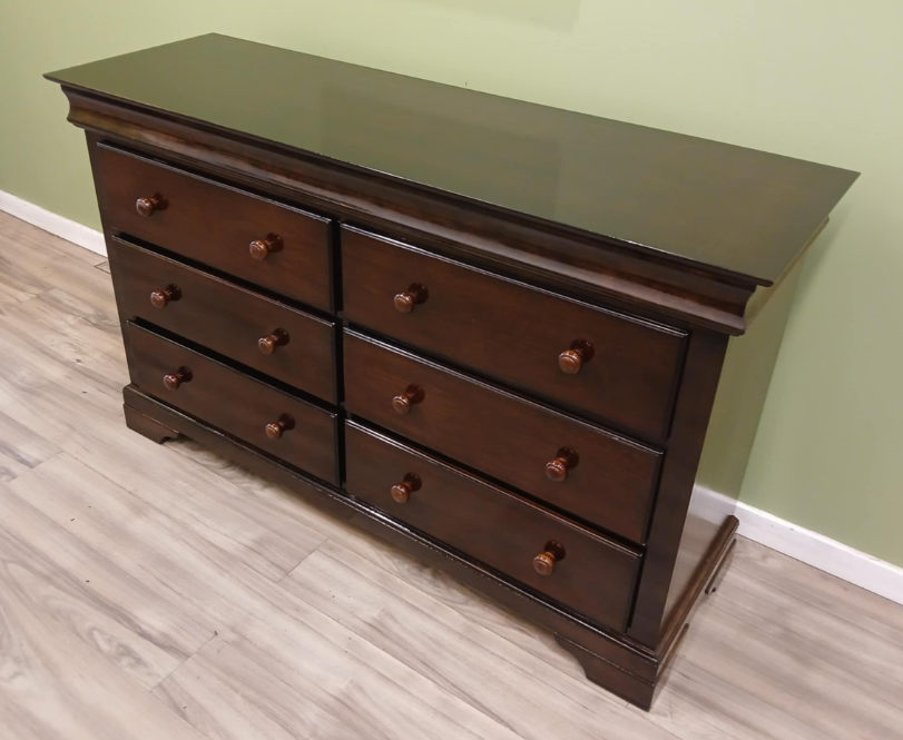 Refinished  the dresser by matching its body colour to drawers